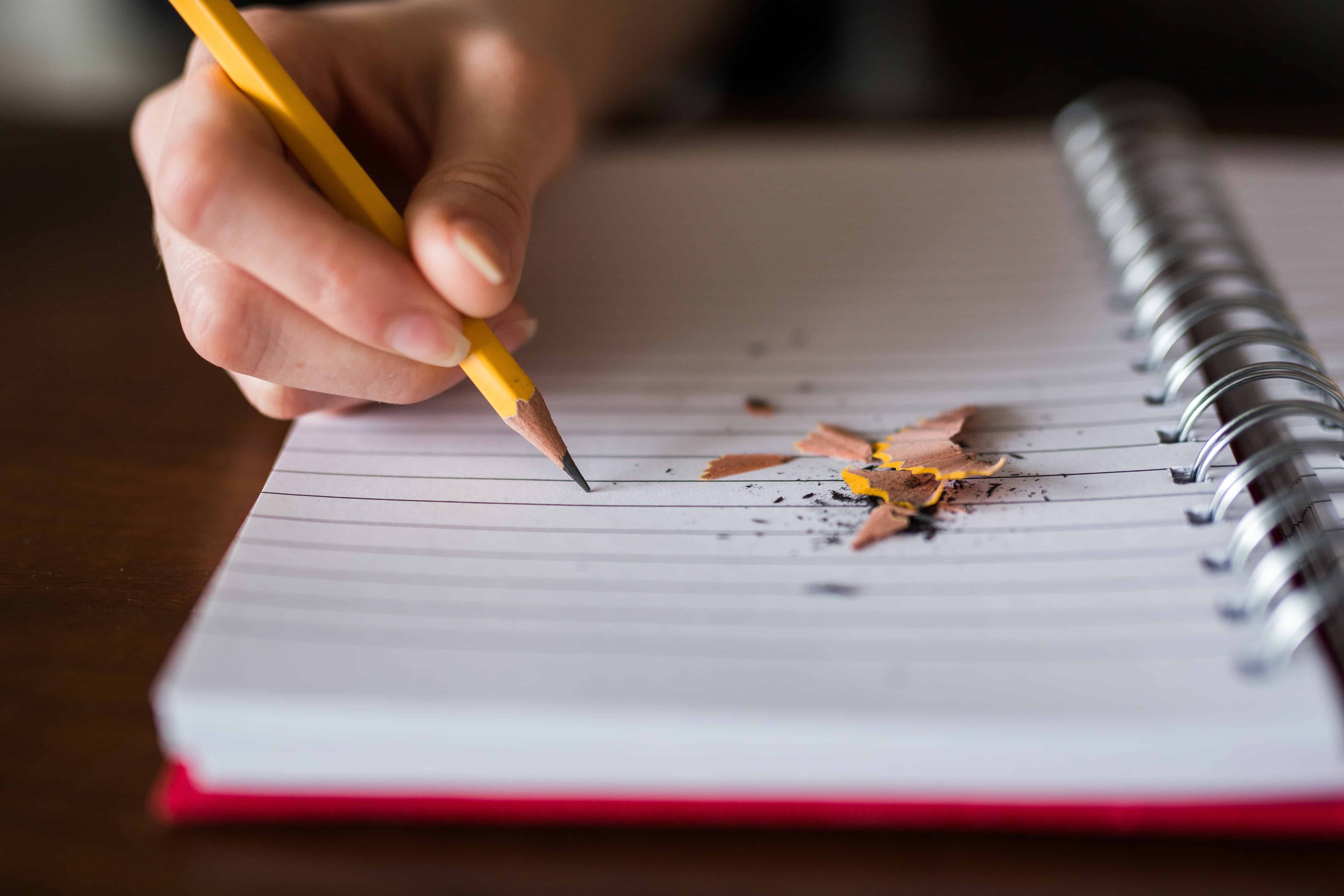 Broken pencil and paper - PayReel